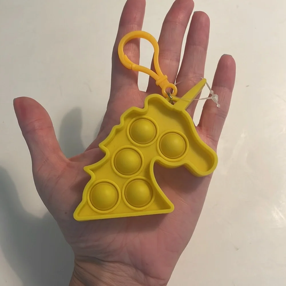 NEW yellow unicorn push bubble fidget keychain